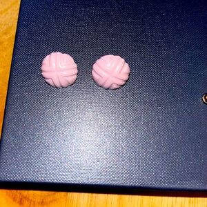 These vintage earrings are round in shape.Pierced back made of metal.